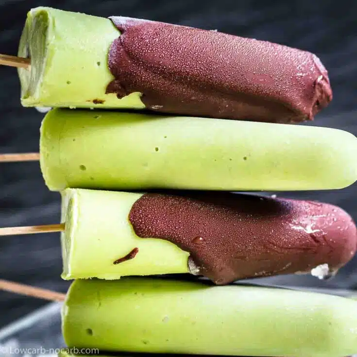 Avocado Ice Popsicles with Magic Shell tucked on top of each other