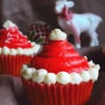 Keto Santa Hats Cupcakes #lowcarb #keto #sugarfree #christmas #xmas #cupcakes #icing #homemade #healthy #sprinkles #santahat #santacupcakes #santashatcupcakes #healthycupcakes