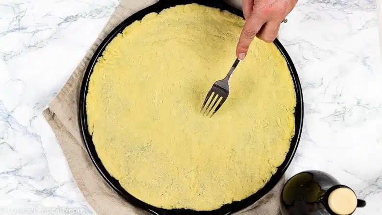 Rainbow Keeto Pizza Recipe use fork to make holes