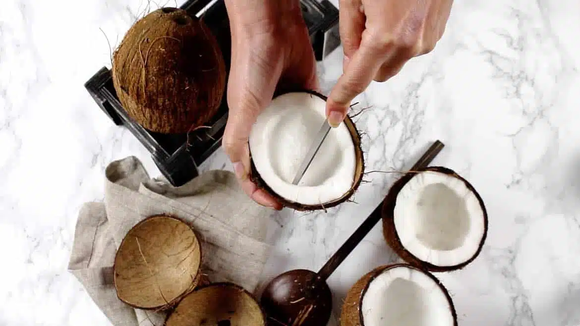 Cutting the coconut meat with a knife