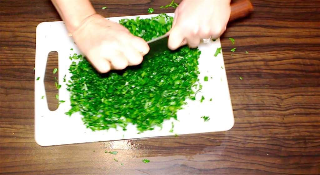 cutting parsley for tabbouleh salad