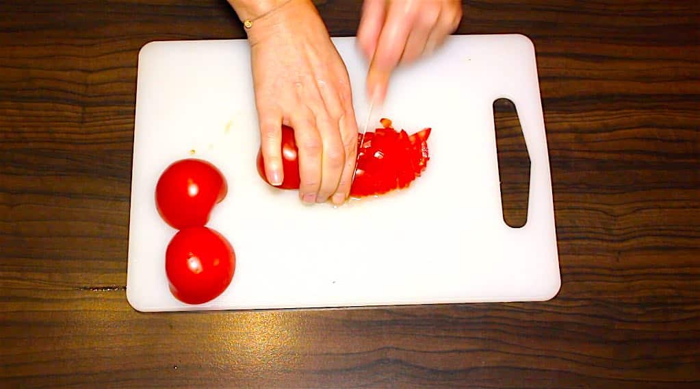 cutting tomatoes for salad