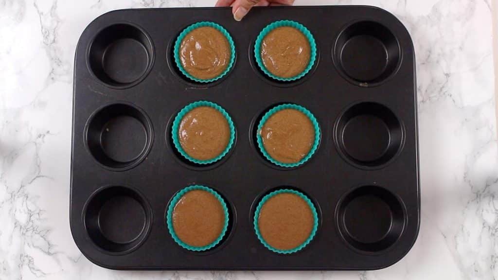 Chocolate Keto Cupcakes pouerd in the silicon muffin molds