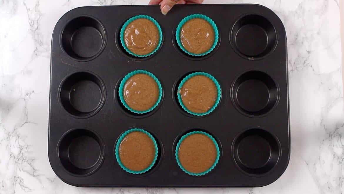 Chocolate Keto Cupcakes pouerd in the silicon muffin molds