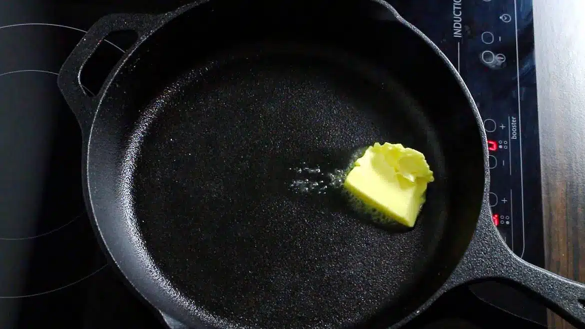 heating butter on a cast iron