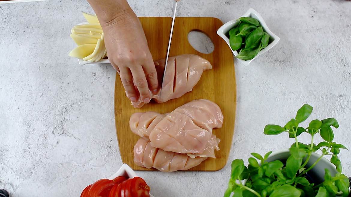 cutting chicken breasts