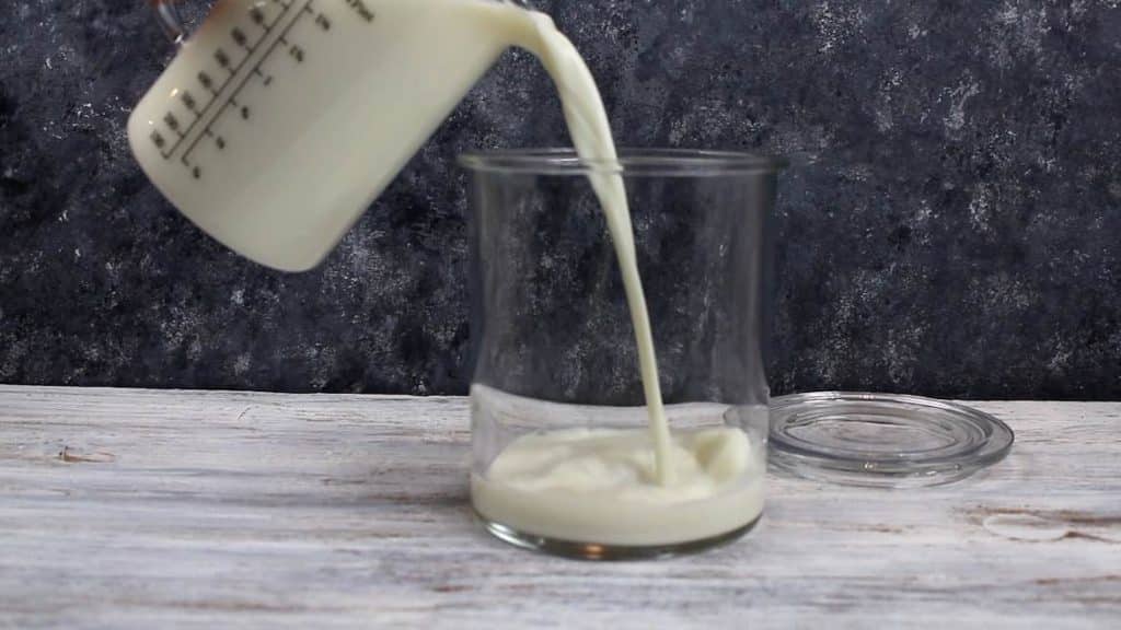 Poring the Fresh Organic Milk for Natural Whey making
