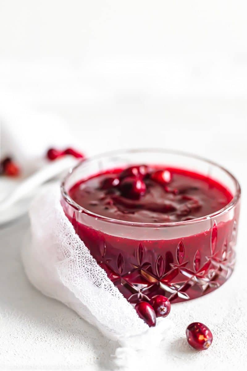 healthy cranberry sauce recipe in a glass serving bowl