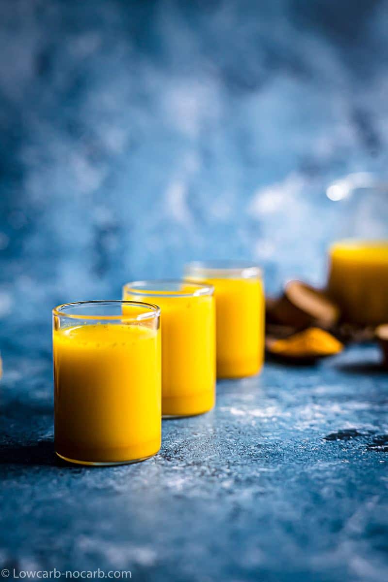 Turmeric Ginger Shot ready to drink in a mini glasses