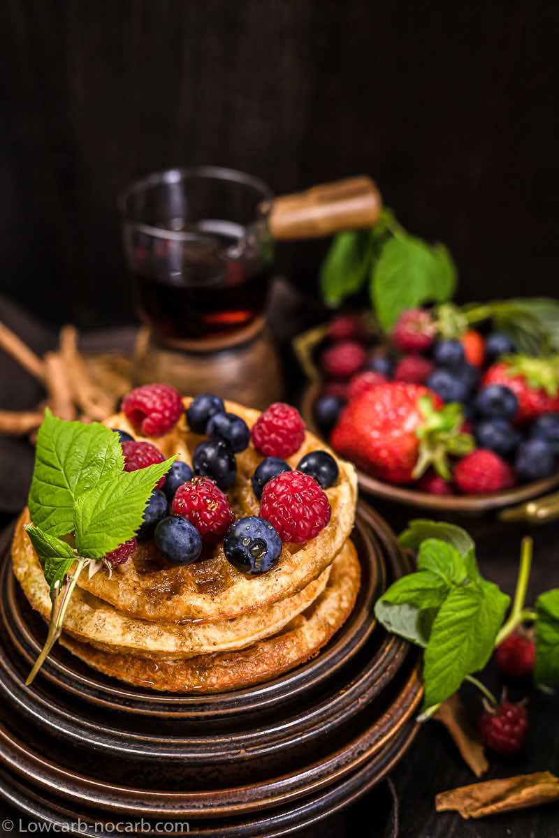 Breakfast Chaffle Recipe on a stack of brown plates