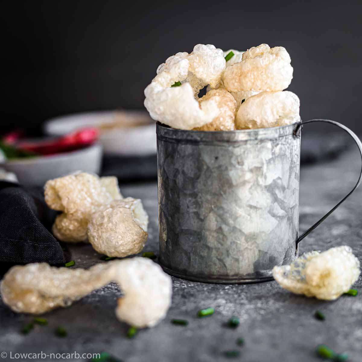 Pork Rinds in a metal cup