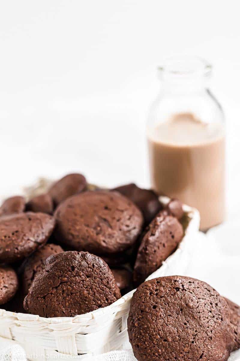 Keto Cookies in a basket with cacao milk in the background