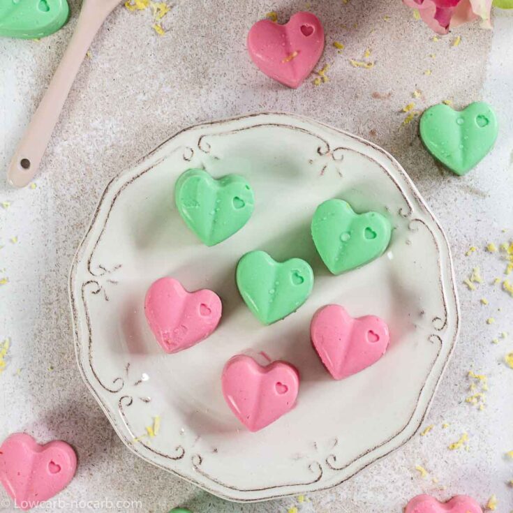 Heart shape Fat Bombs in pink and green colour on a plate