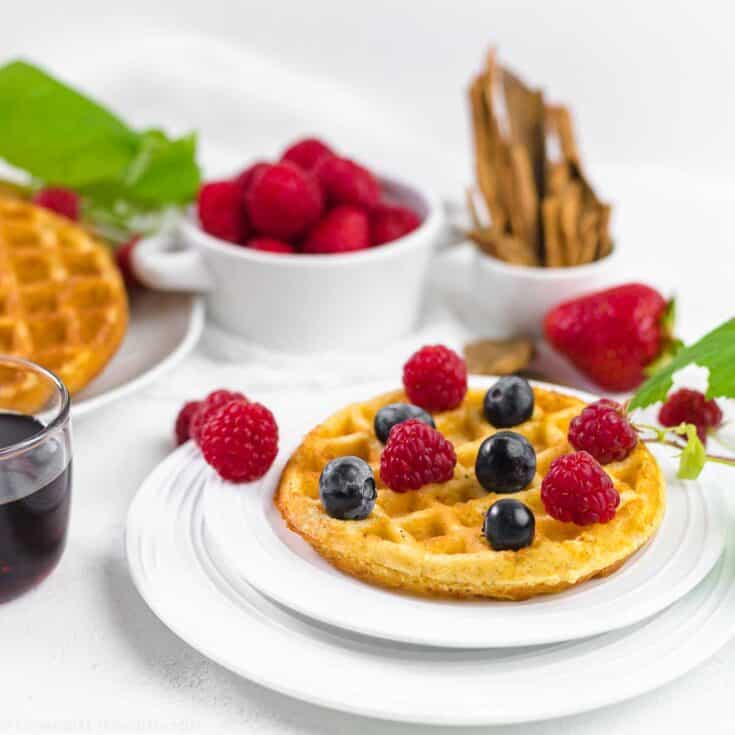 Chaffle Keto Waffle breakfast on a white plate with berries
