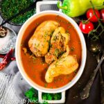 Tomato Sauce Keto Stuffed Peppers in a white casserole