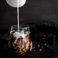 Keto Cold Brew Coffee with milk pouring into the glass
