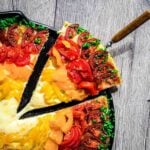 Low Carb Rainbow Pizza with piece to be served