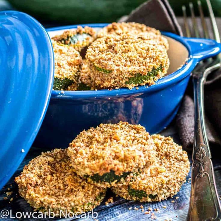 Keto Breadcrumbs baked Zucchini in a blue bowl