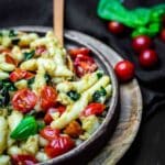 Keto Gnocchi With Pesto served on a wooden plate