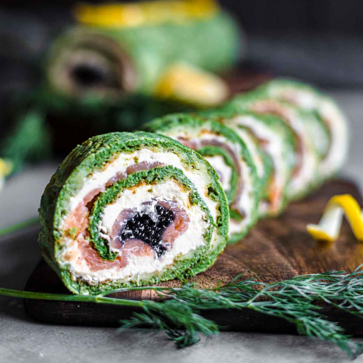 Salmon Roulade Low Carb on a Wooden Board