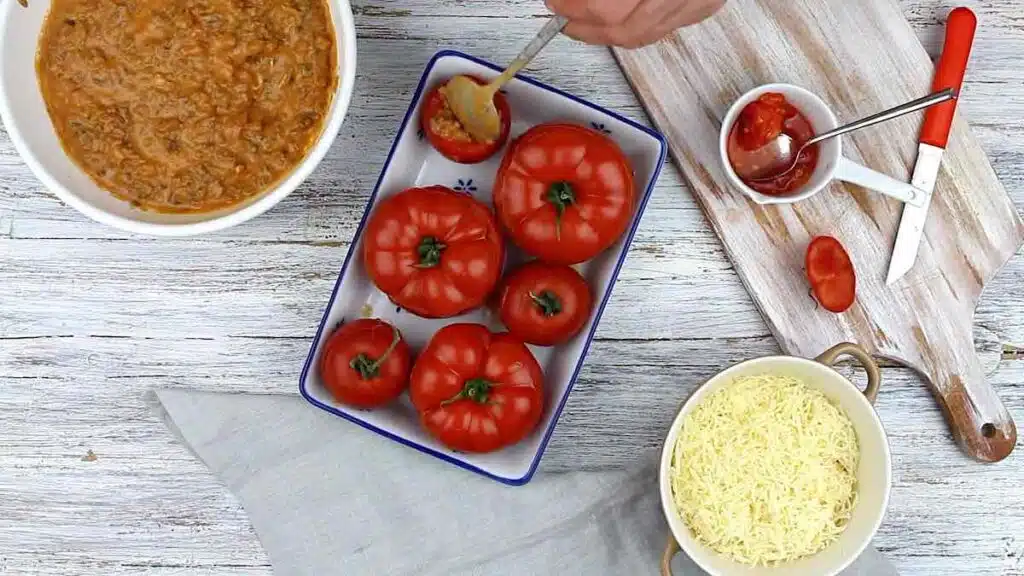 Healthy Stuffed Tomatoes adding sauce