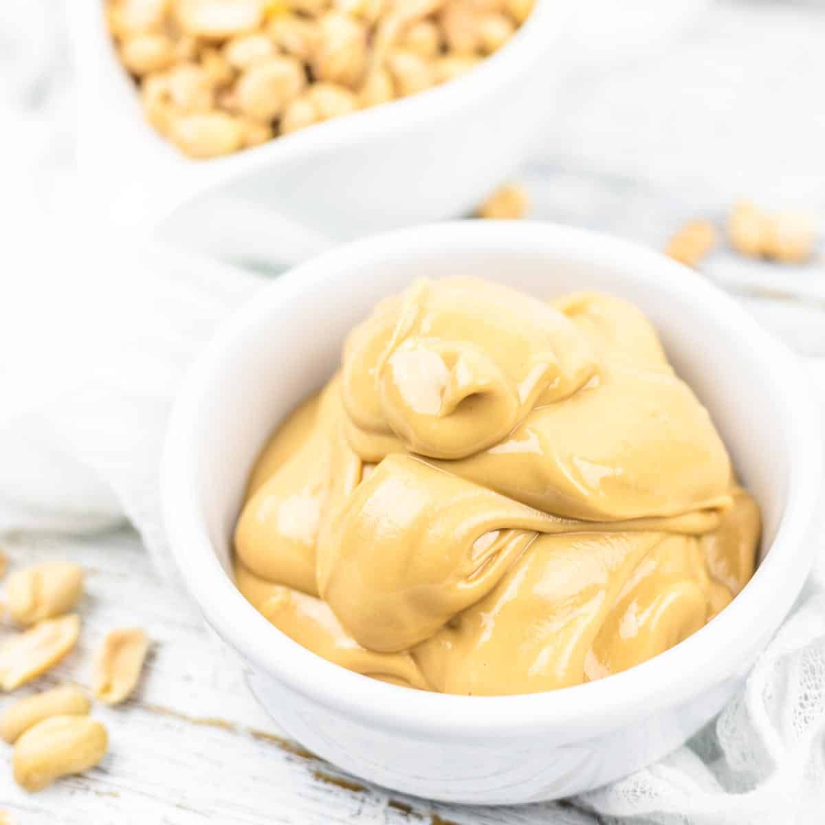 How To Make Peanut Butter in a white bowl ready to serve