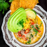 Quick and Easy Keto Taco Soup Recipe served with taco shells and avocado
