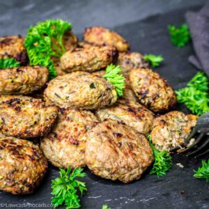 Keto Burgers Mini Bites on a black board