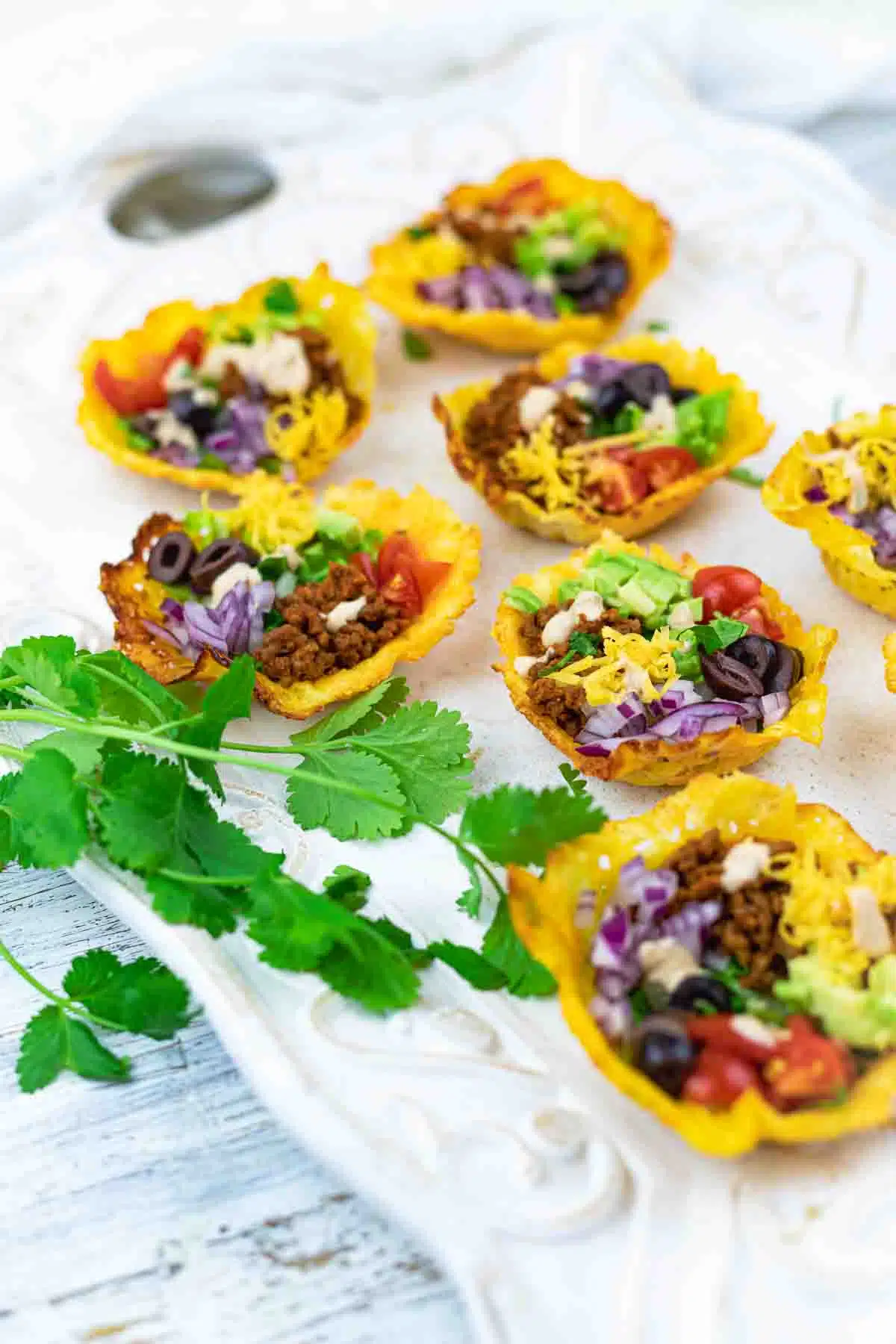 Low Carb taco Shells as an appetizer on a white tray