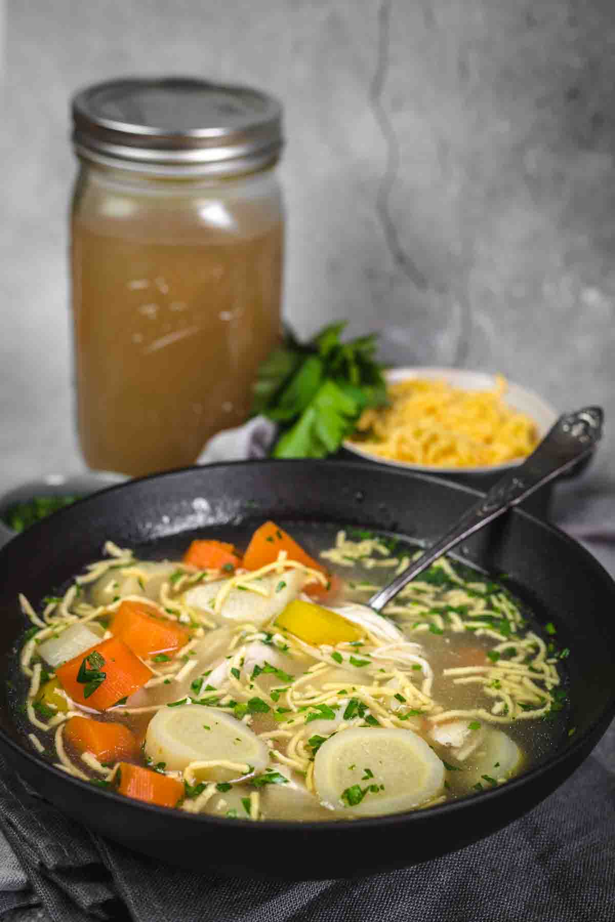 Keto Chicken Noodle Soup in a black plate