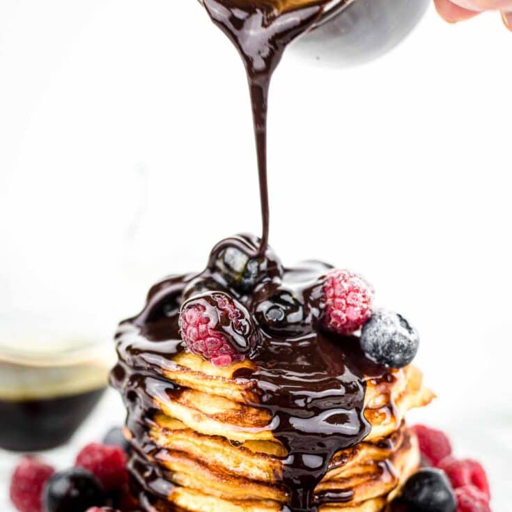 How To Make Sugar Free Chocolate Syrup poured on top of berries