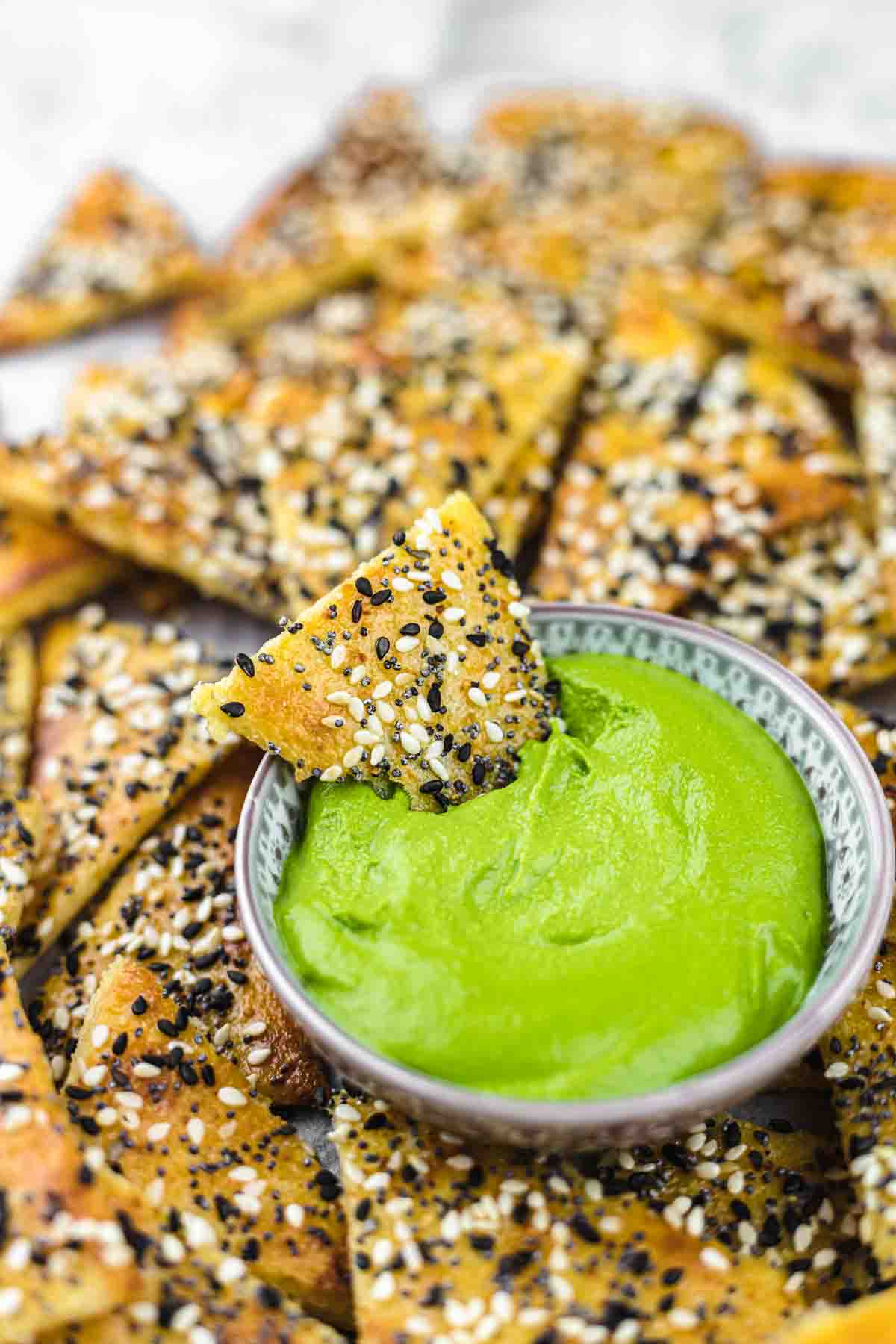 Everything Bagel Keto Crackers with green dressing.