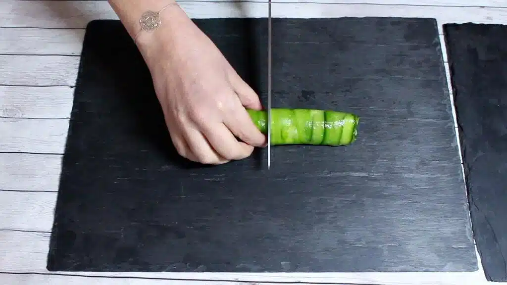 Avocado Cucumber Roll cutting log.