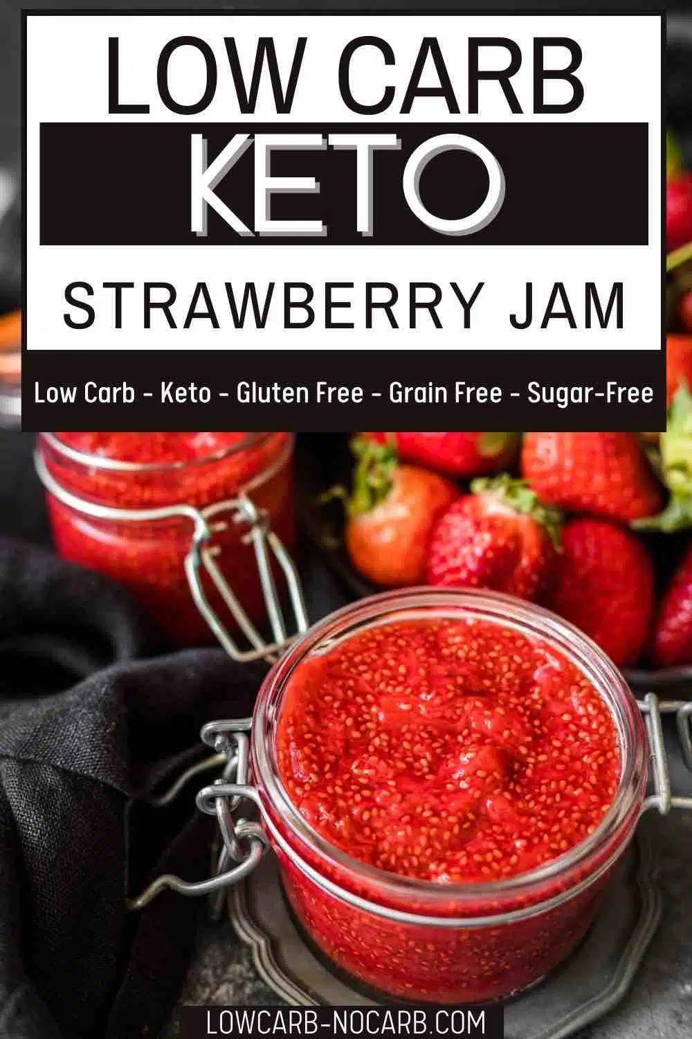 Homemade Strawberry Jam in a glass container with fresh strawberries.