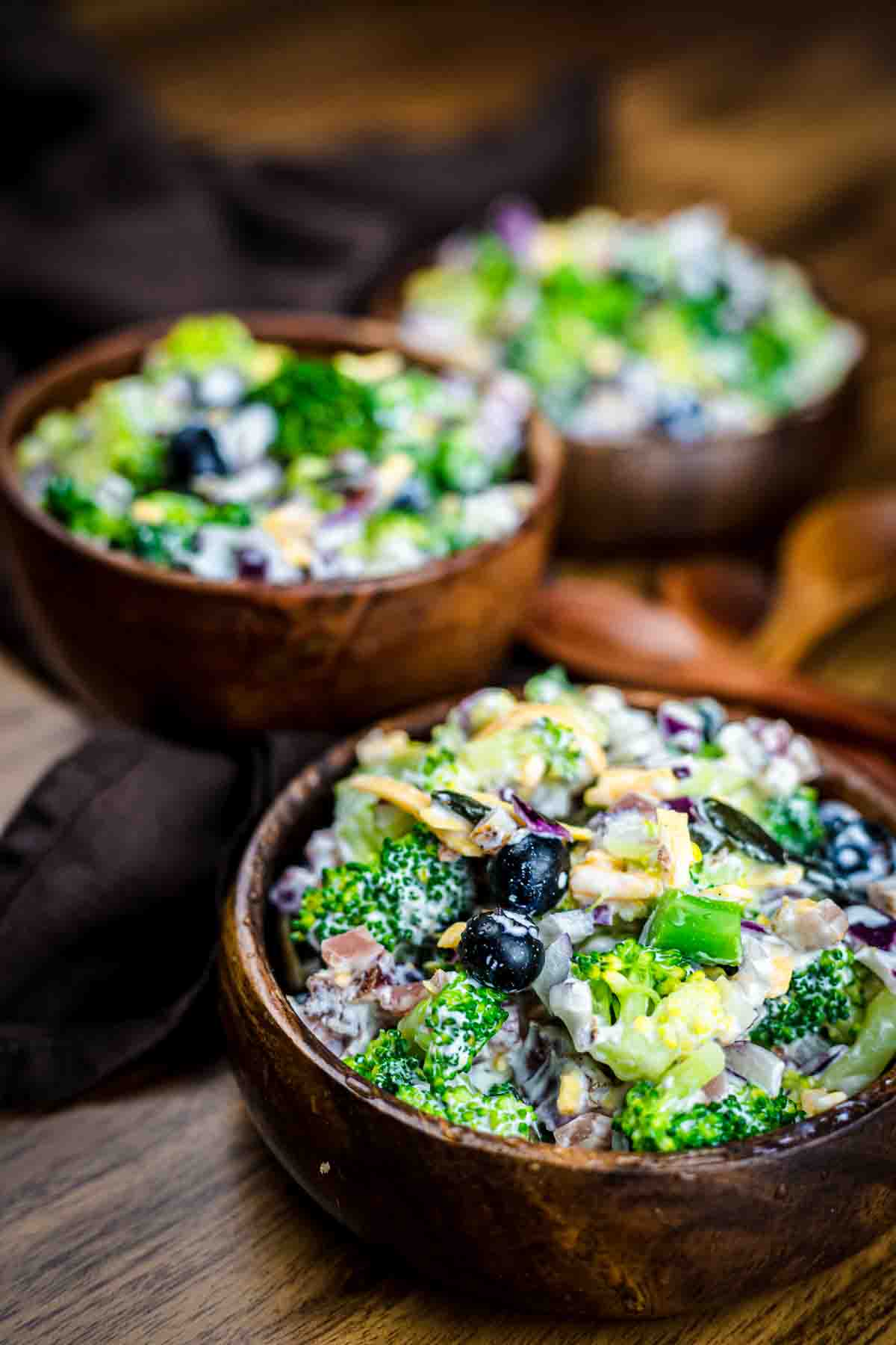 Amish Broccoli Salad in a wooden bowl.