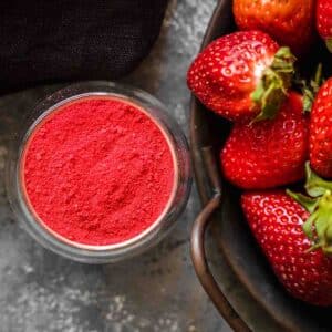 Strawberry Powder with fresh strawberries.
