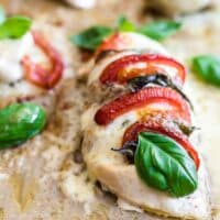 Chicken filled with mozzarella, basil and tomatoes.