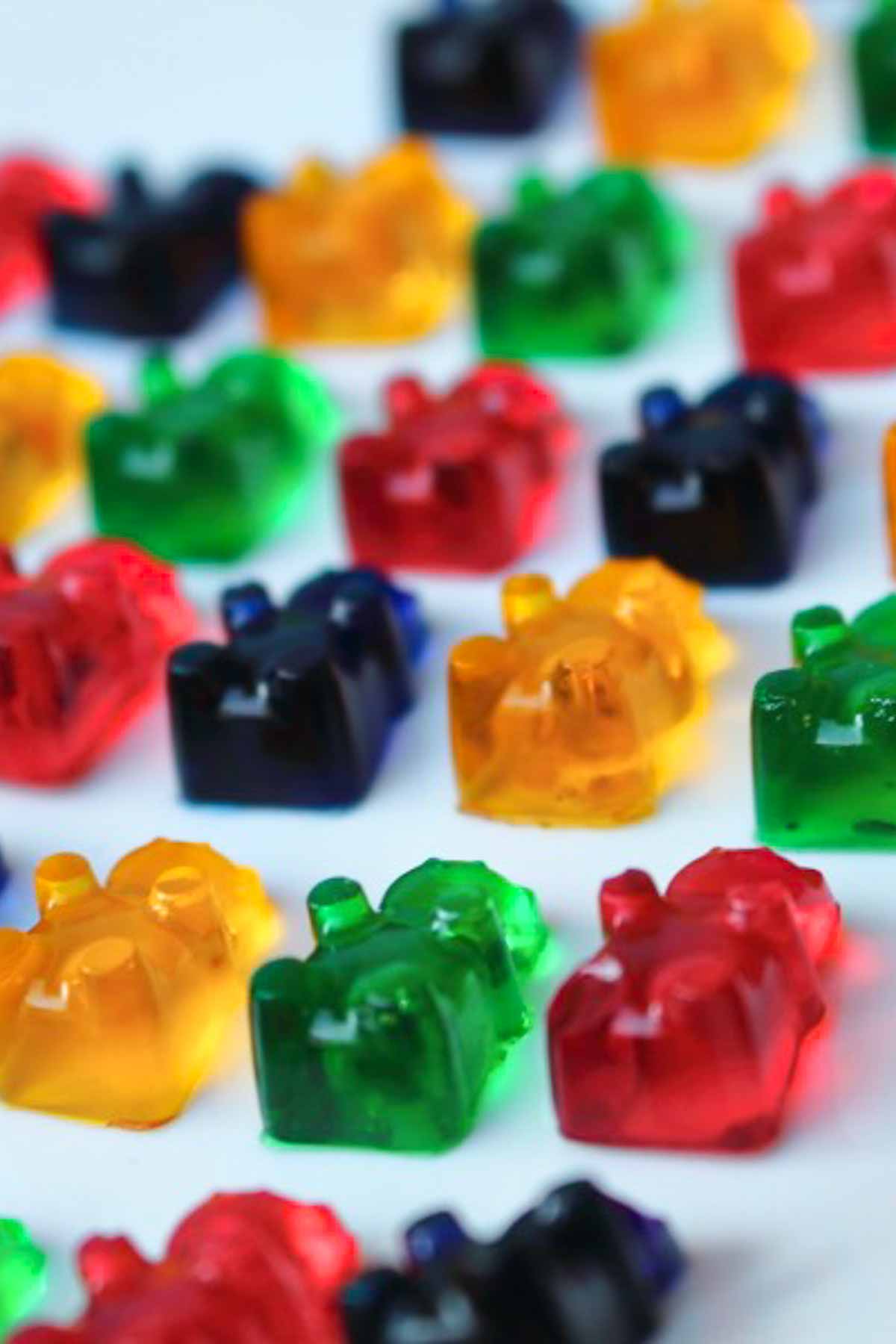 sugar free gummy bears on a white surface.