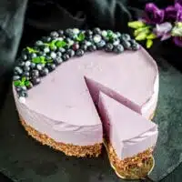 Blueberry Cheesecake on a stone board.