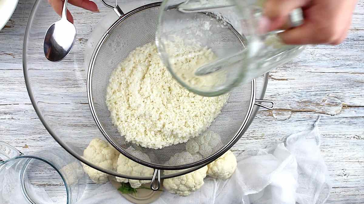 What is a Cauliflower Rice sieving the water out.