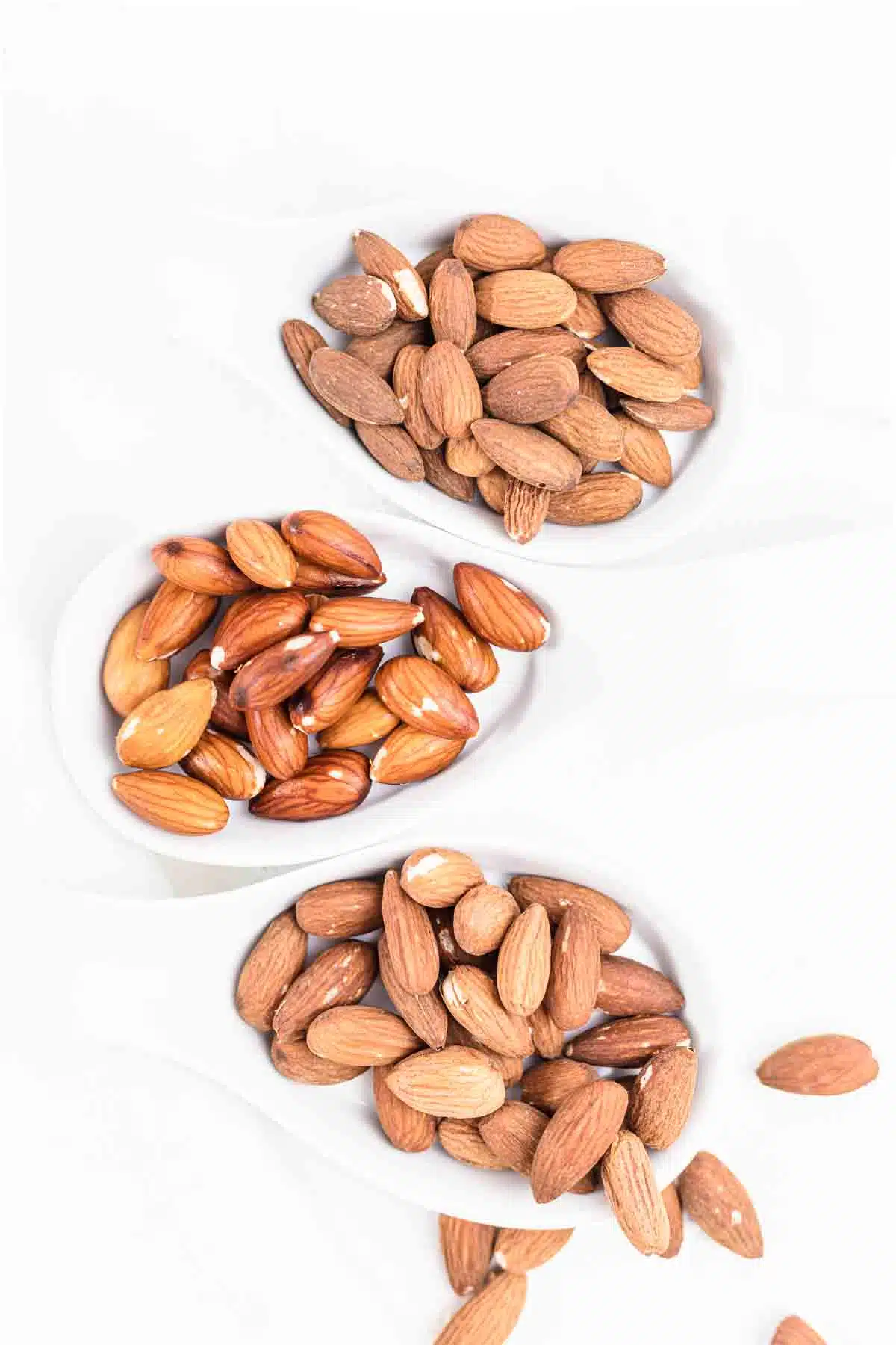Activated Almonds on a white plates.