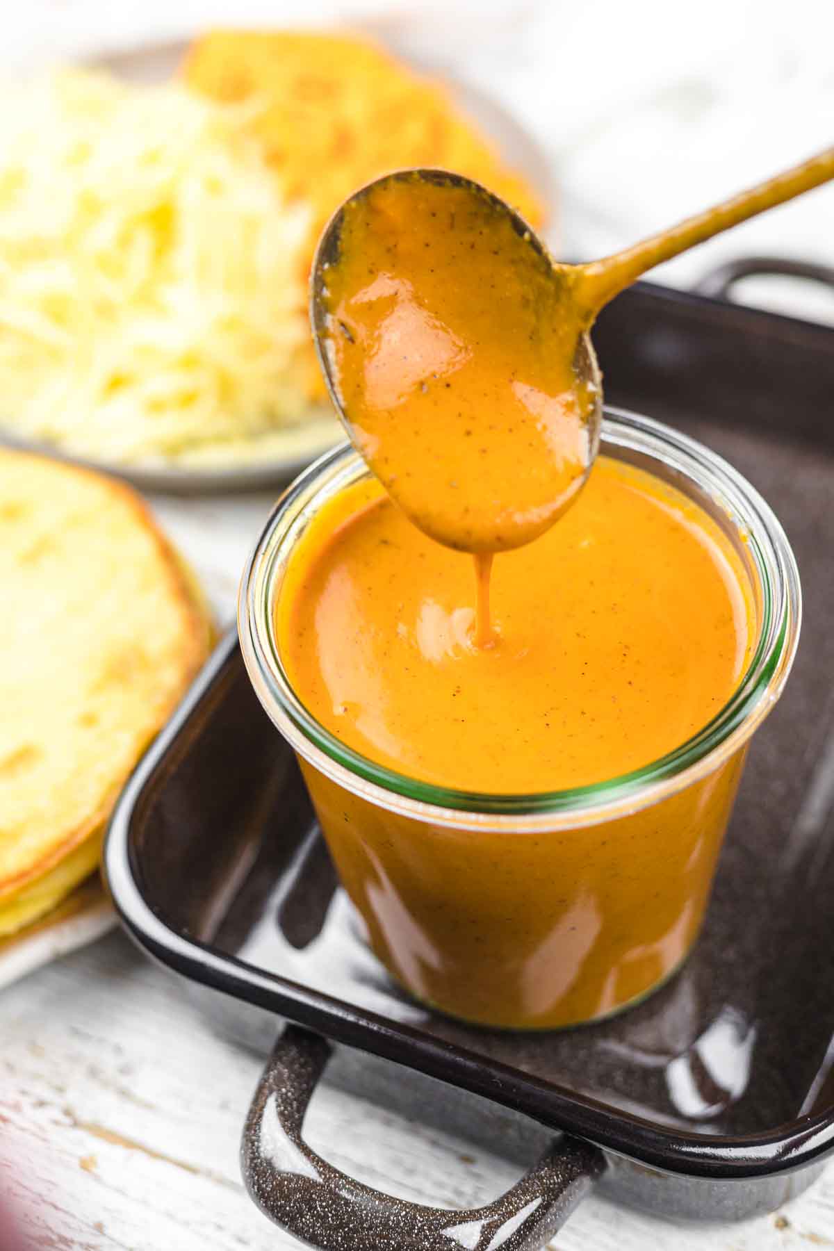 Keto mexican sauce in a glass.