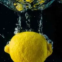 Whole lemon inside water.