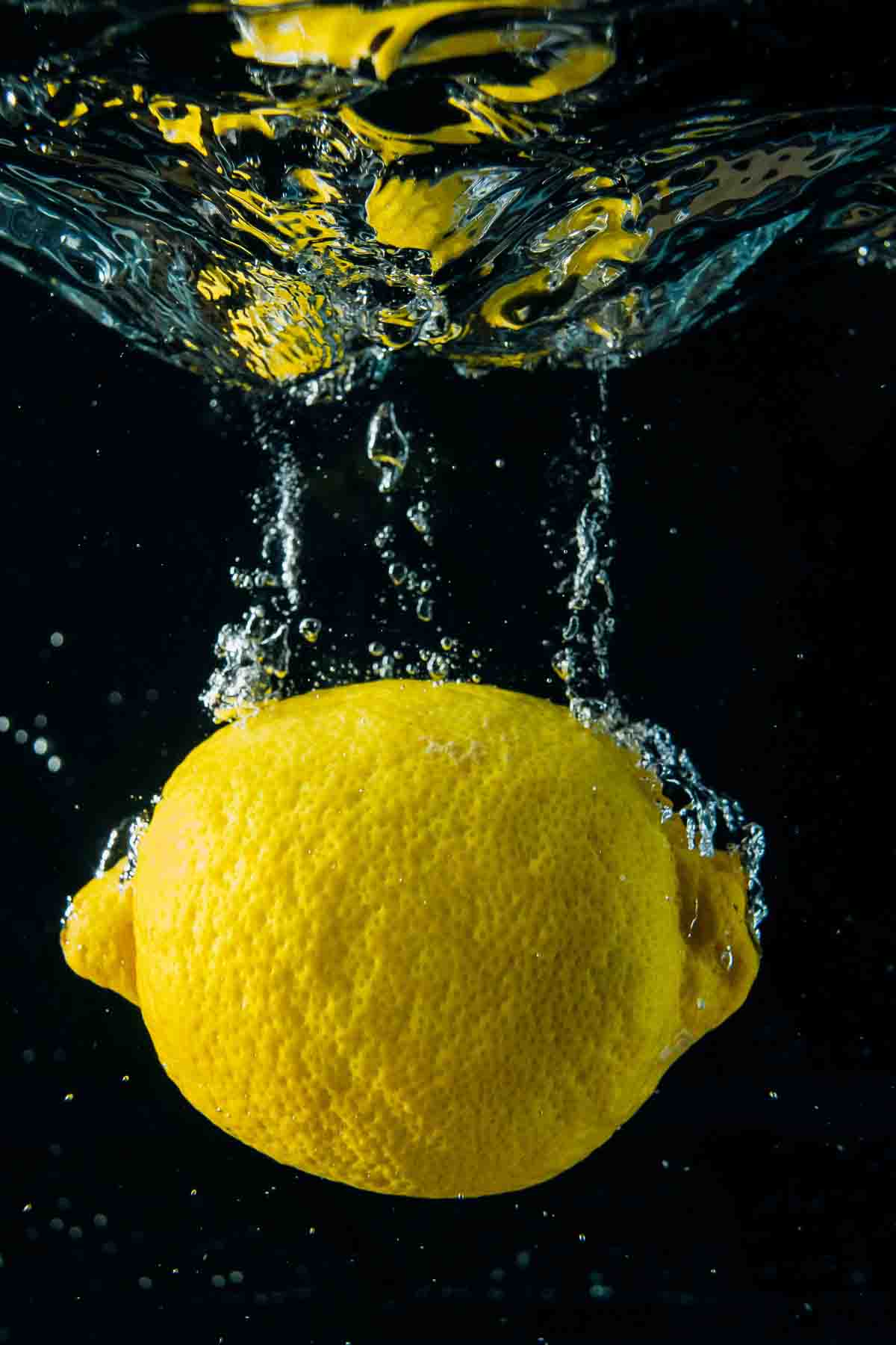 Whole lemon inside water.