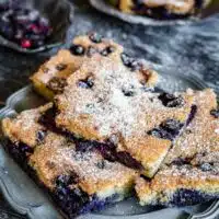 Sheet Pan Easy Berry Cake Blueberry on a metal plate.
