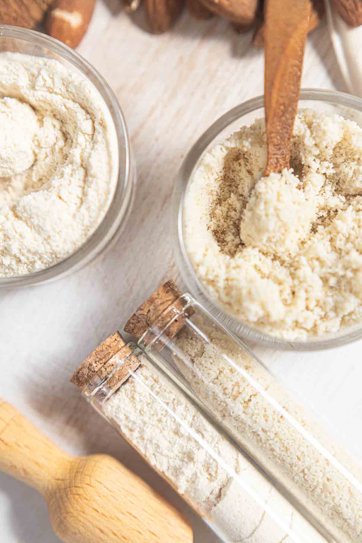 Best uses for almond flour and coconut flour on the wooden board.