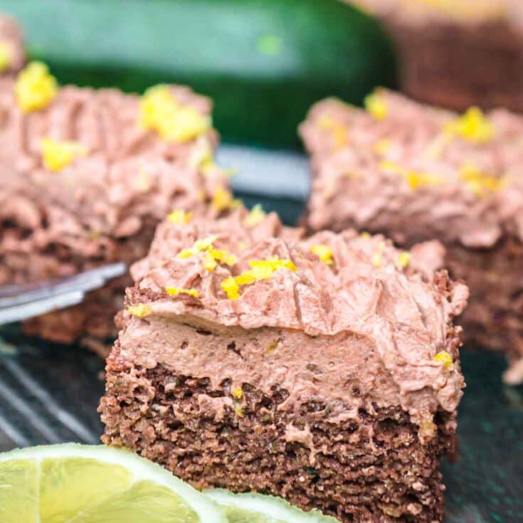 Moist chocolate zucchini cake with zest on top.