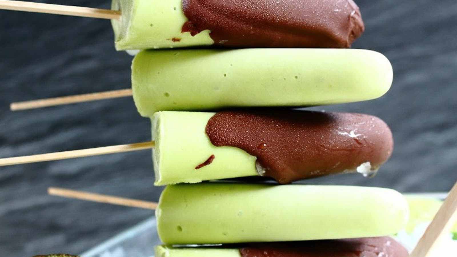 Avocado Popsicles laered on top of each other. 
