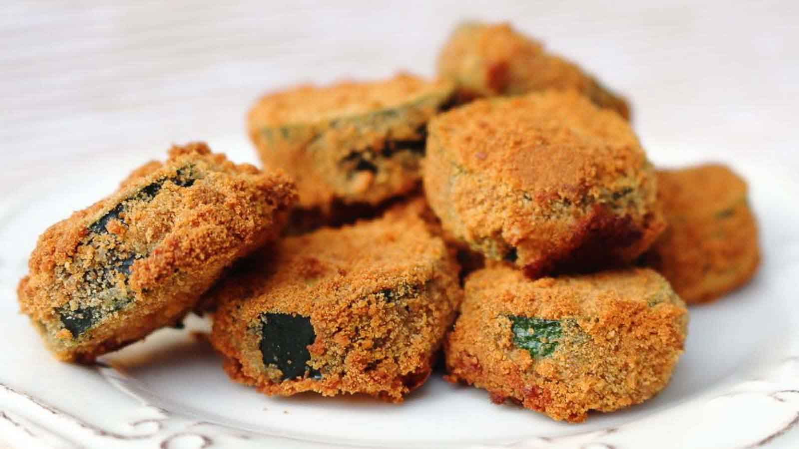 Crispy Baked Zucchini served on a white plate. 