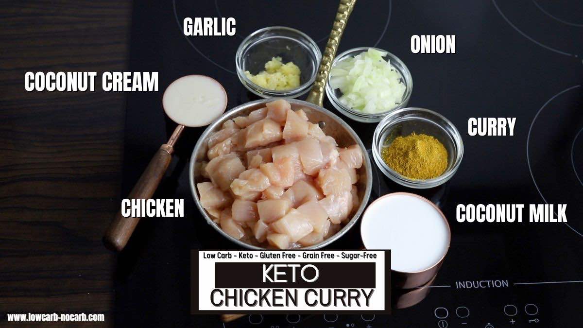 Keto chicken curry ingredients on a stovetop.